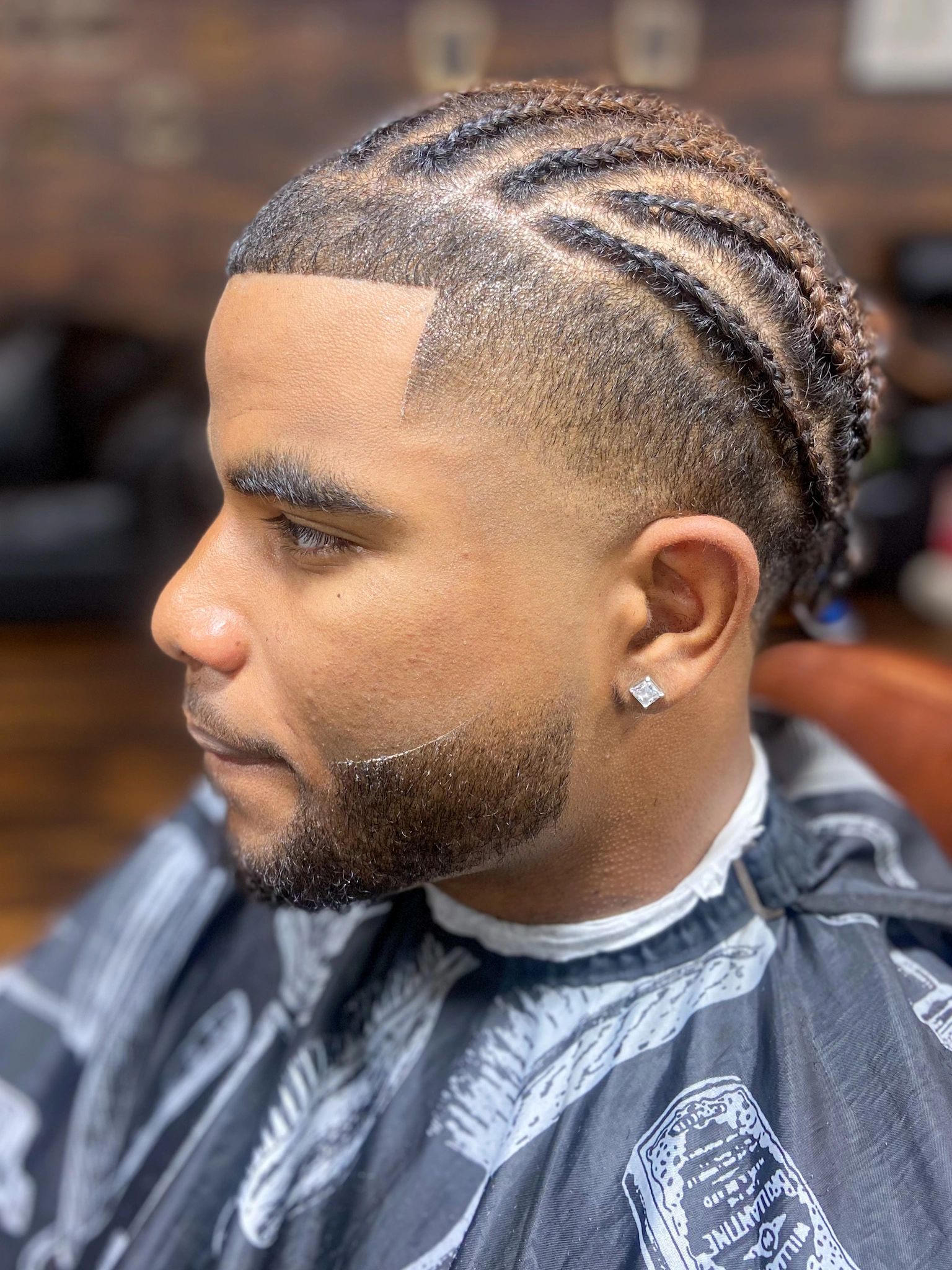 Cornrows with fade and beard